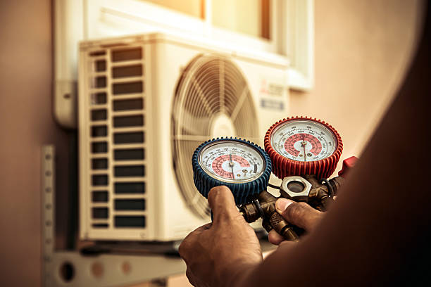 Professional Heat Pump Repair technician working in Edwardsburg, MI